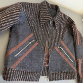 جزییات جیب زیپدار کت زمستانه مدل السا