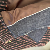 نمای داخلی کت زنانه مدل السا با آستر قهوهای و دوخت مغزی