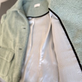 نمای داخلی پالتو زنانه مدل میتا با آستر راهراه