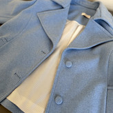 جزییات یقه و آستر راهراه پالتو زنانه زمستانه فوتر