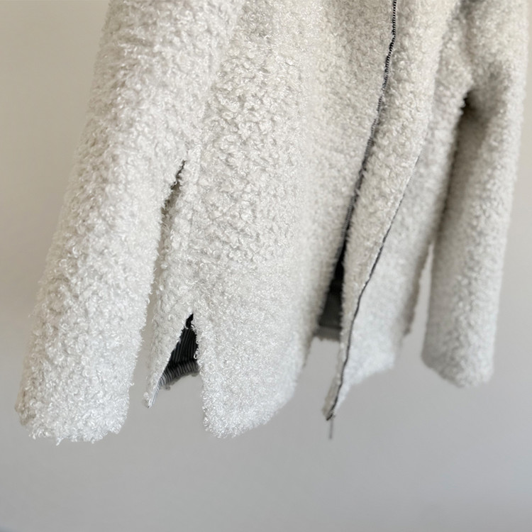 جزییات چاک کناری پالتو زنانه زمستانه ملودی